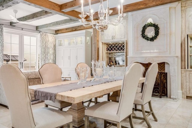 dining room with a chandelier and beamed ceiling