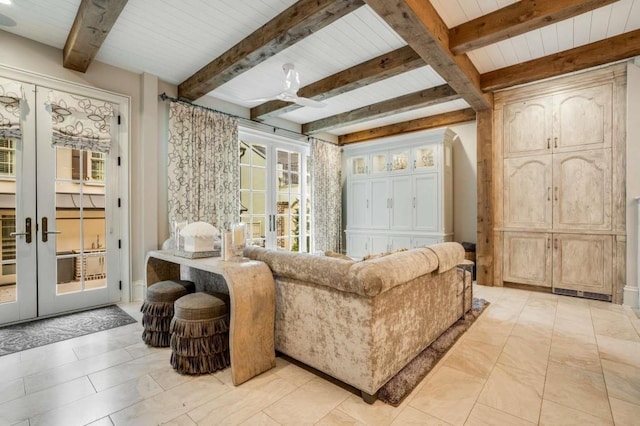 interior space with french doors and beam ceiling