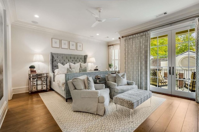 bedroom featuring french doors, crown molding, access to outside, ceiling fan, and hardwood / wood-style floors