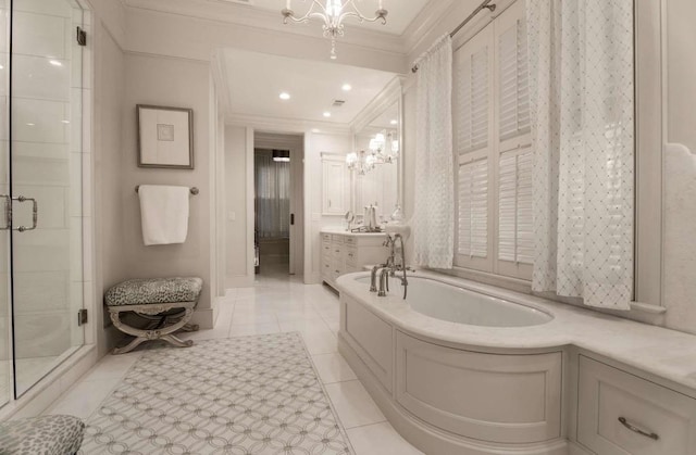 bathroom featuring crown molding, a chandelier, vanity, independent shower and bath, and tile patterned flooring