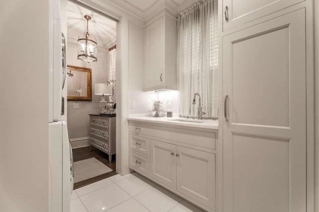 bathroom with vanity and tile patterned flooring