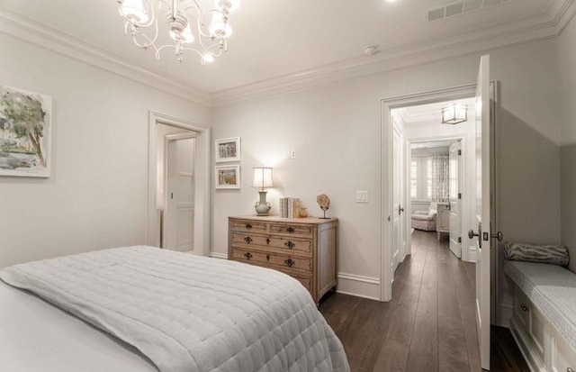 bedroom featuring crown molding, dark hardwood / wood-style floors, and a notable chandelier