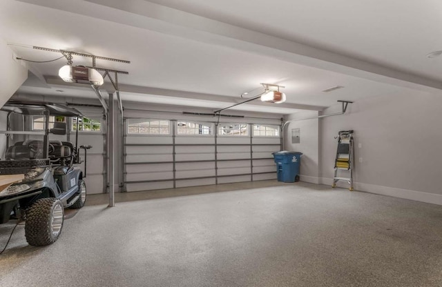 garage featuring a garage door opener