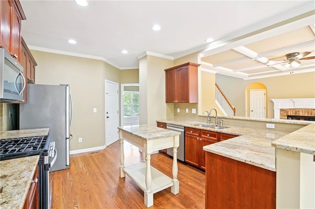 2359 Saint Kennedy Ln, Buford, GA 30518 - kitchen with appliances with stainless steel finishes, recessed lighting, arched walkways, decorative backsplash, and ceiling fan