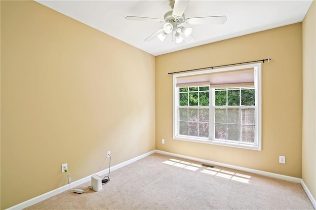 2359 Saint Kennedy Ln, Buford, GA 30518 - spare room featuring carpet flooring and ceiling fan