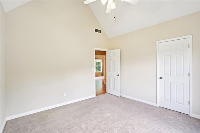 2359 Saint Kennedy Ln, Buford, GA 30518 - unfurnished bedroom featuring carpet floors, high vaulted ceiling, and a ceiling fan