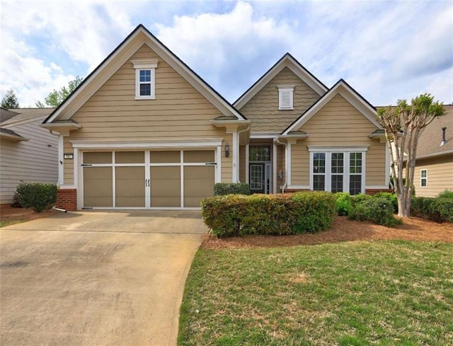 802 Dusky Sap Ct, Griffin, GA 30223 - view of front of home with driveway, a front lawn, and brick siding