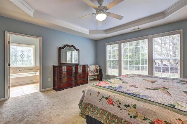 802 Dusky Sap Ct, Griffin, GA 30223 - bedroom featuring a raised ceiling, crown molding, carpet flooring, ensuite bath, and a ceiling fan