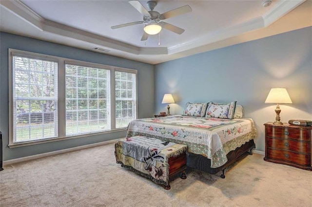 802 Dusky Sap Ct, Griffin, GA 30223 - bedroom with a tray ceiling, carpet flooring, ornamental molding, and multiple windows