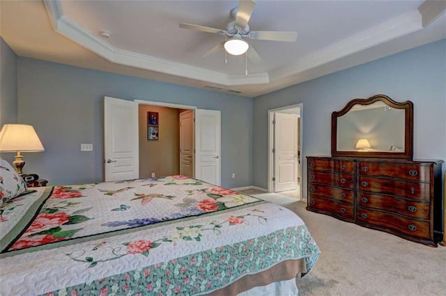 802 Dusky Sap Ct, Griffin, GA 30223 - carpeted bedroom featuring a raised ceiling, ornamental molding, and ceiling fan