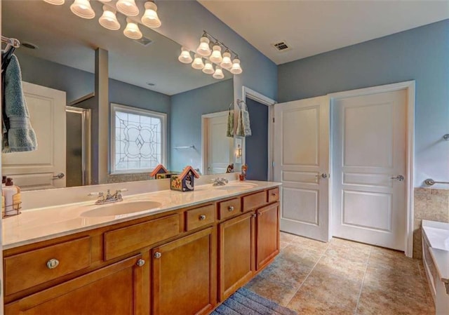 802 Dusky Sap Ct, Griffin, GA 30223 - bathroom with a bath, a stall shower, and double vanity