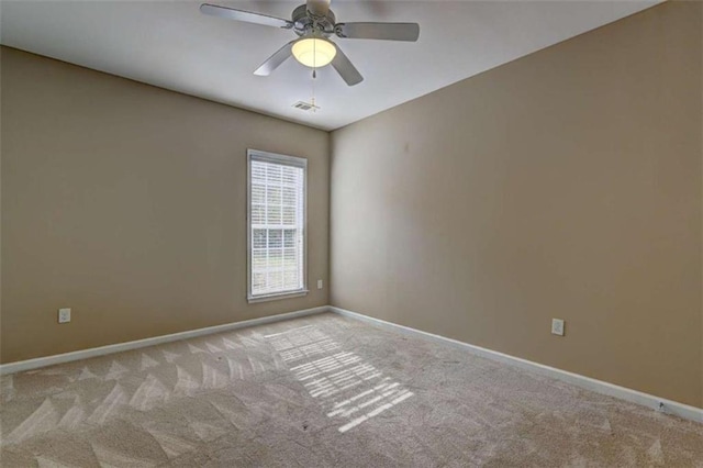 802 Dusky Sap Ct, Griffin, GA 30223 - carpeted spare room with baseboards and ceiling fan