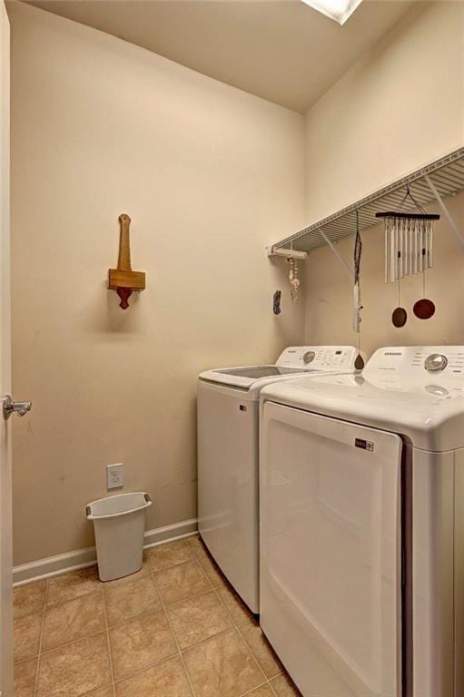 802 Dusky Sap Ct, Griffin, GA 30223 - washroom with separate washer and dryer and light tile patterned floors