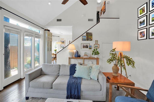 770 Barnett St NE, Atlanta, GA 30306 - living area with high vaulted ceiling, healthy amount of natural light, wood finished floors, and ceiling fan
