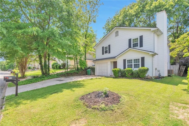 912 Third St, Stone Mountain, GA 30083 - view of front of house featuring an attached garage, a chimney, driveway, and a front yard