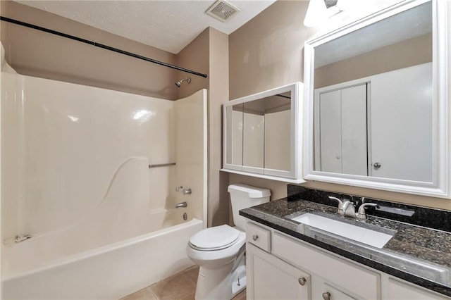 912 Third St, Stone Mountain, GA 30083 - full bath featuring toilet, vanity,  shower combination, and tile patterned flooring