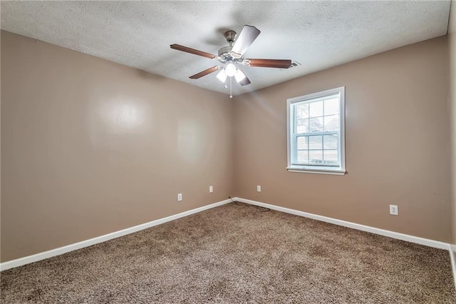 912 Third St, Stone Mountain, GA 30083 - empty room featuring carpet flooring, baseboards, ceiling fan, and a textured ceiling
