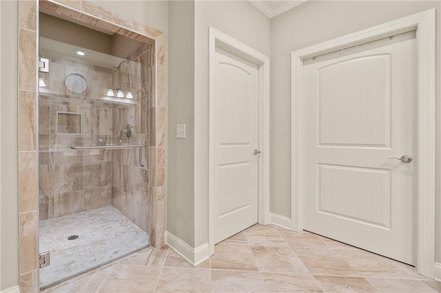 full bath with a stall shower and baseboards