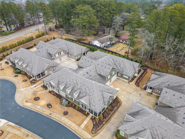 birds eye view of property with a residential view