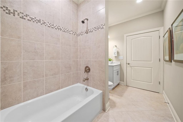 bathroom with tile patterned floors, shower / washtub combination, crown molding, baseboards, and vanity