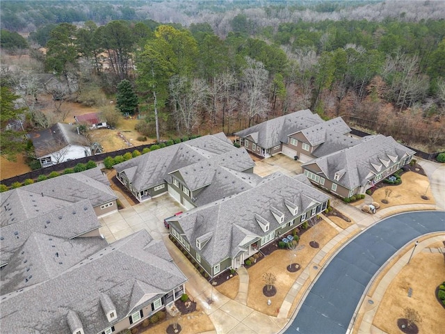 bird's eye view with a residential view and a forest view