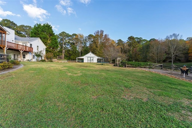 view of yard with a wooden deck