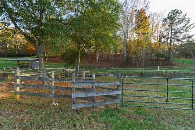 view of gate featuring a rural view