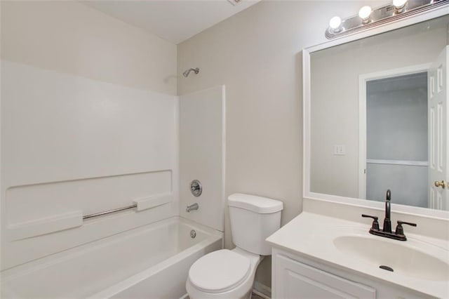 full bathroom with toilet, vanity, and tub / shower combination