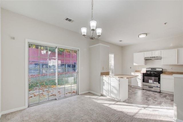 kitchen featuring an inviting chandelier, white cabinetry, light carpet, and stainless steel gas range