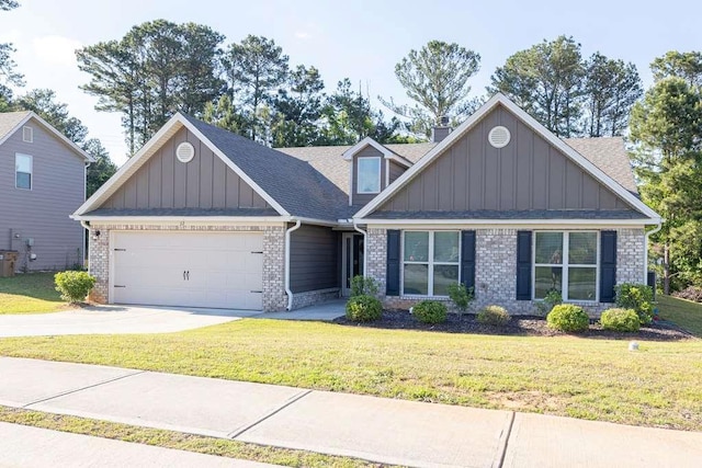 craftsman-style home with an attached garage, brick siding, a front lawn, driveway, and board and batten siding