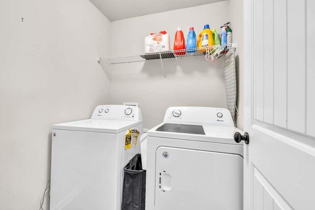 laundry area with washer and dryer