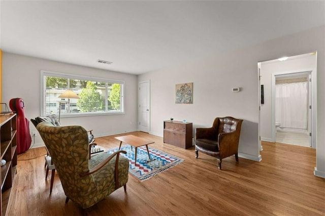 449 Clairemont Ave Unit H3, Decatur, GA 30030 - living area with light wood-style flooring