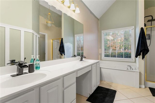 bathroom with tile patterned flooring, vanity, high vaulted ceiling, and independent shower and bath