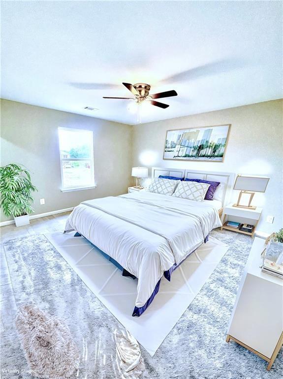 bedroom featuring ceiling fan
