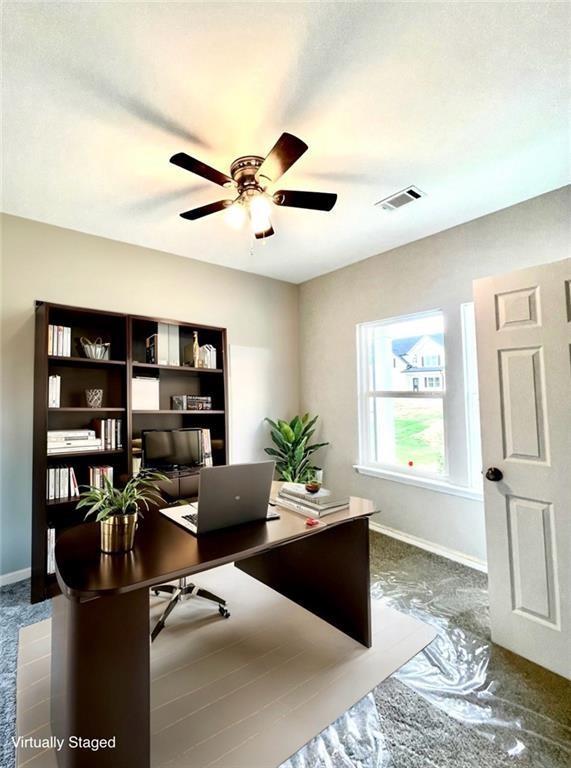 office area with ceiling fan