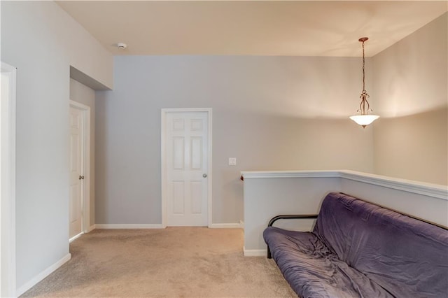 living area with light colored carpet