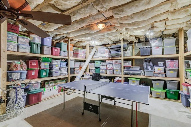 game room featuring concrete flooring