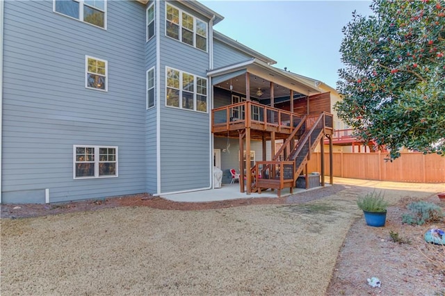 back of house featuring a patio, ceiling fan, and a deck