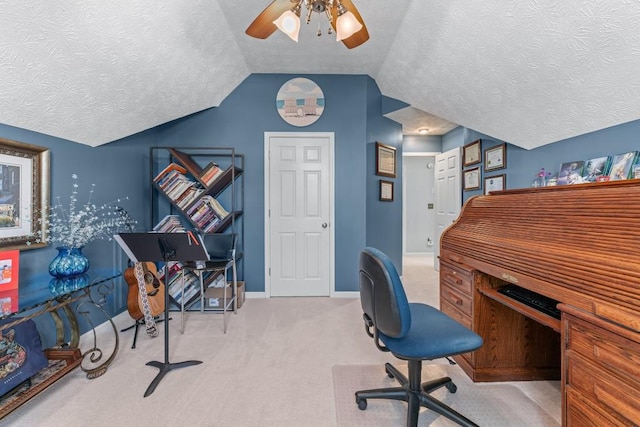 office space with carpet floors, a ceiling fan, a textured ceiling, and lofted ceiling