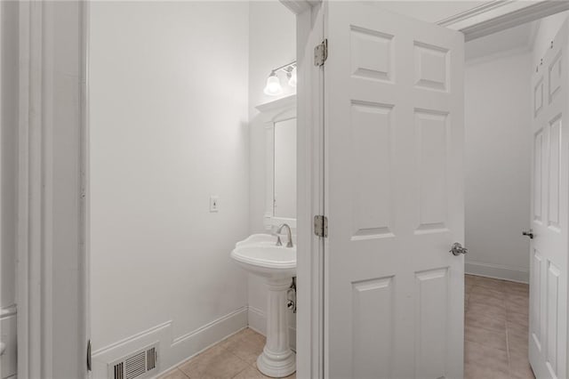 bathroom featuring tile patterned flooring