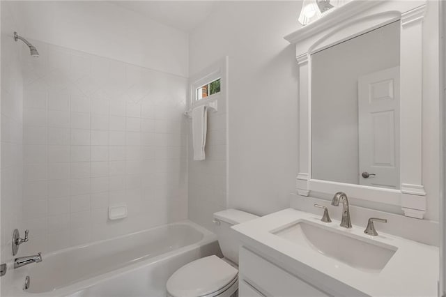 full bathroom featuring toilet, vanity, and  shower combination