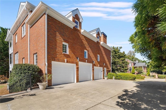 view of property exterior featuring a garage