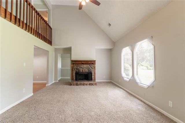 10 Briarcliff Pl, Stockbridge, GA 30281 - unfurnished living room with a ceiling fan, high vaulted ceiling, carpet flooring, and a fireplace