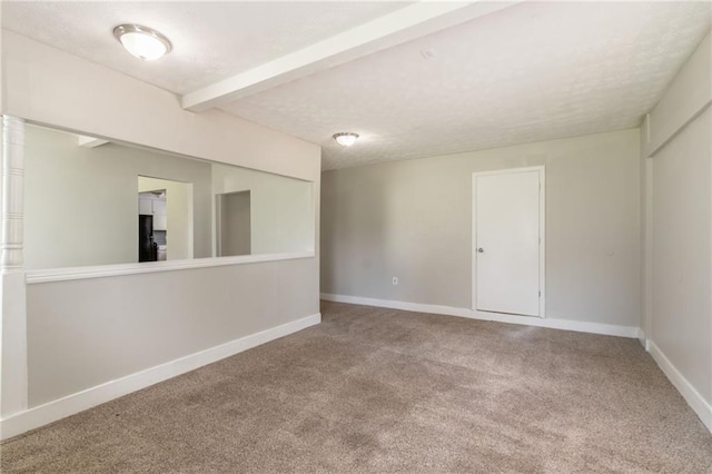 10 Briarcliff Pl, Stockbridge, GA 30281 - carpeted spare room featuring a textured ceiling and baseboards
