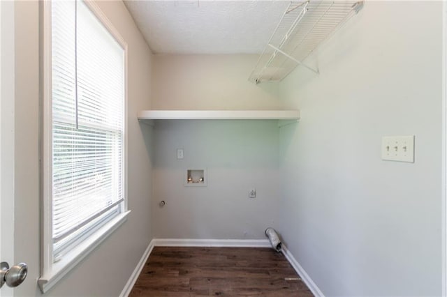 10 Briarcliff Pl, Stockbridge, GA 30281 - laundry room with hookup for a washing machine, wood finished floors, hookup for an electric dryer, and a textured ceiling