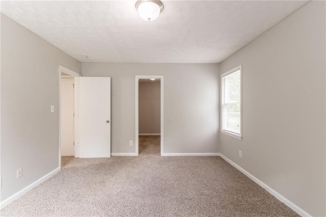 10 Briarcliff Pl, Stockbridge, GA 30281 - unfurnished room featuring carpet floors and a textured ceiling