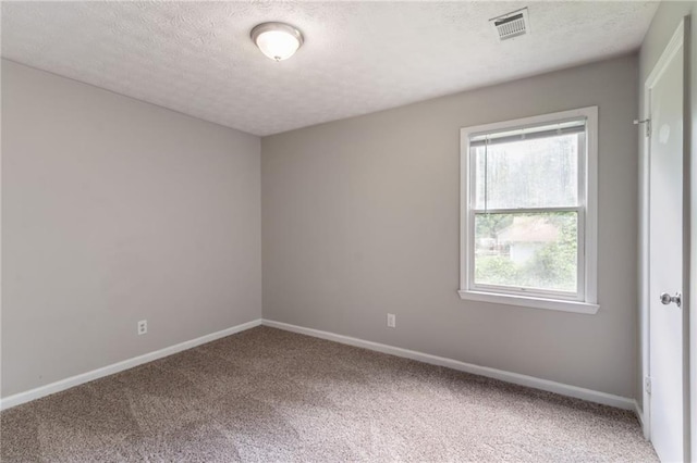10 Briarcliff Pl, Stockbridge, GA 30281 - spare room with carpet and a textured ceiling