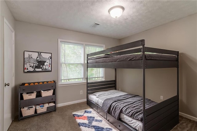 10 Briarcliff Pl, Stockbridge, GA 30281 - bedroom with carpet floors and a textured ceiling