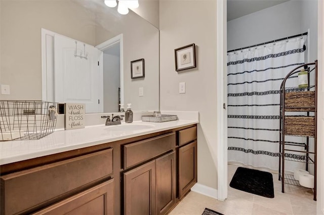 bathroom with vanity and tile patterned floors