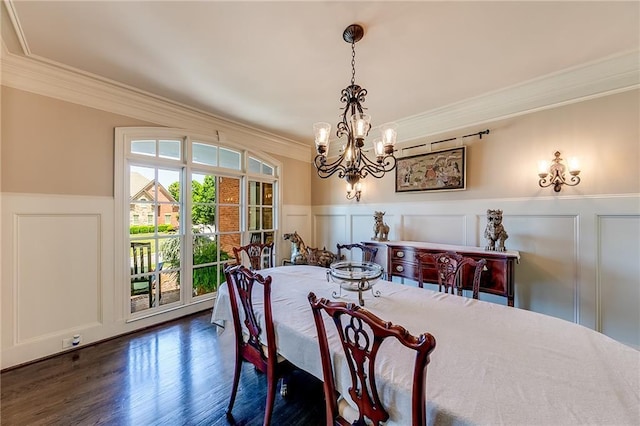 5925 Boulder Bluff Dr, Cumming, GA 30040 - dining area featuring a decorative wall, arched walkways, a chandelier, french doors, and ornamental molding